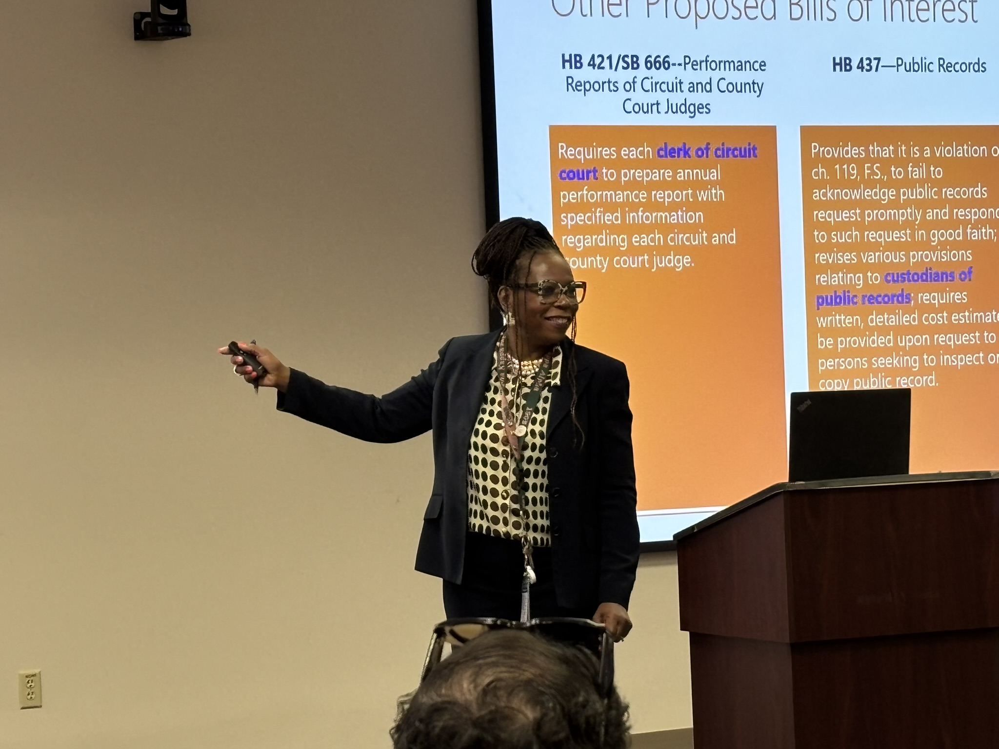 Roberta Walton Johnson speaking at a policy presentation